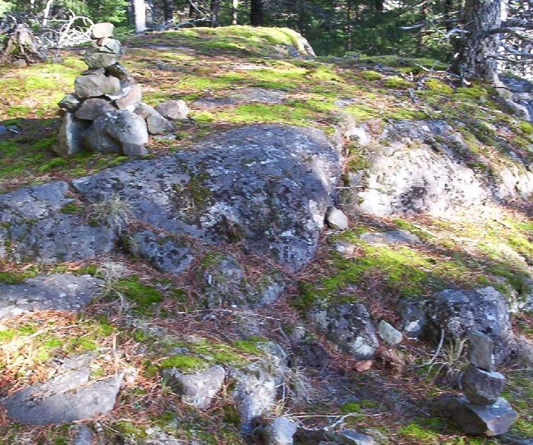 Chinese Mountains - Stone piles help mark the trail